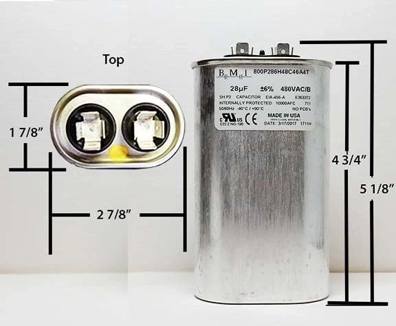 A picture of an electric motor capacitor.