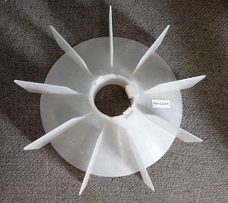 A white plastic fan on the floor.