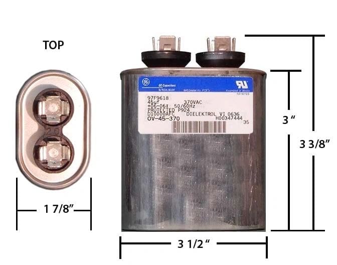 A diagram of a capacitor with the top and bottom half marked.